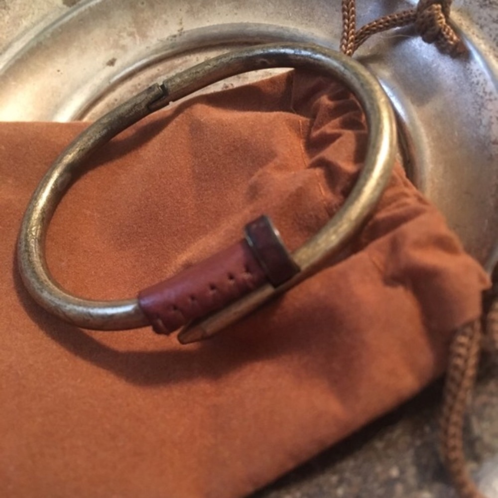 Gold and leather nail bracelet